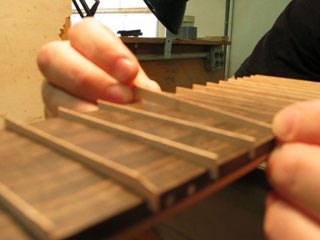 Factory tour — Handcarving & Finishing